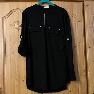 Bulotus long sleeve convertible to 3/4. Quarter zip